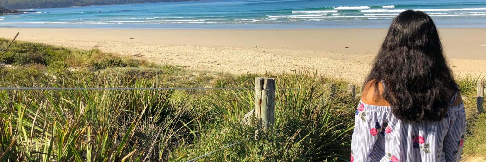 girl-overlooking-beach